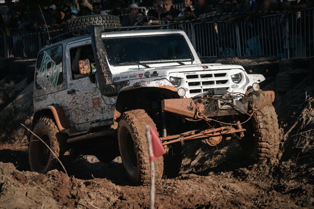 An Off Road Car Driving in the Mud